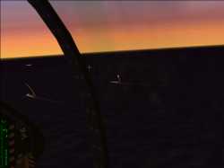 The U.S. Fleet fires Tomahawks at a Chemical Plant. Notice the deck gun firing on the front of the ship on the left.